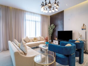 Apartment, 3 Bedrooms | Living area