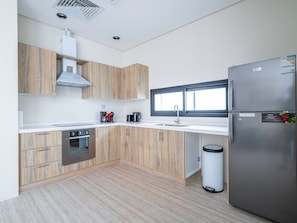 Apartment, 3 Bedrooms | Private kitchen | Fridge, microwave, oven, stovetop - Mabaat - Hittin - 519 (Riyadh)