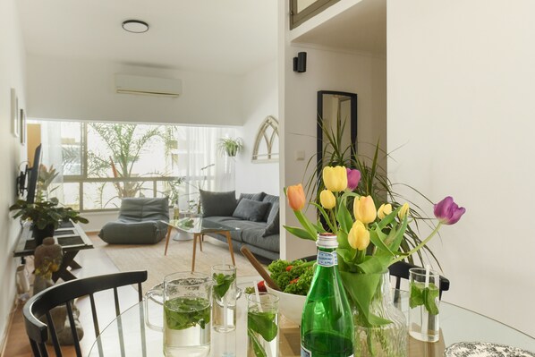 Apartment | Living area | 50-inch LCD TV with cable channels, TV - Stylish 2-Bedroom Green Oasis (Tel Aviv)