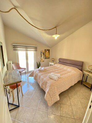 2 bedrooms, in-room safe, soundproofing, iron/ironing board