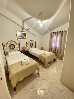 2 bedrooms, in-room safe, soundproofing, iron/ironing board