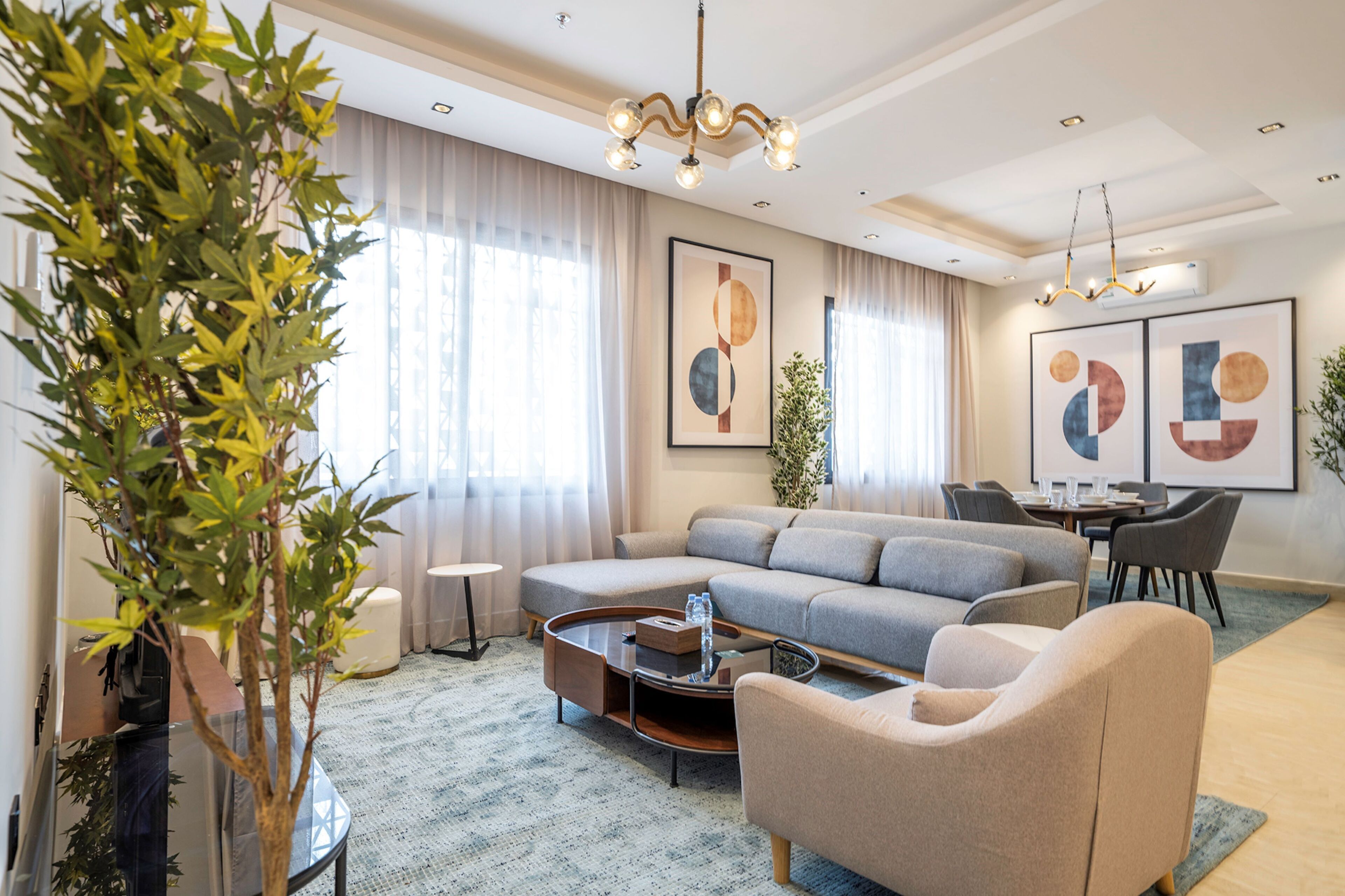 Apartamento, 3 habitaciones | Zona de estar | Televisión LCD de 55 pulgadas con canales digitales, una televisión
