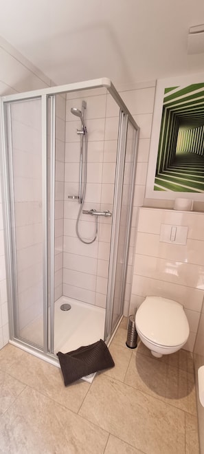 Shower, free toiletries, hair dryer, towels