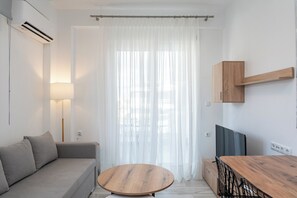 Apartment, 1 Bedroom | Living area | 40-inch Smart TV with cable channels, TV - Perla Residential Complex (Pangaio)