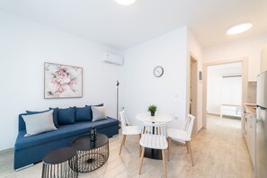 Appartement, 1 chambre | Coin séjour