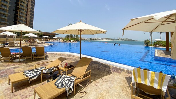 Pool - Modern beachfront 1BR apartment (Dubai)