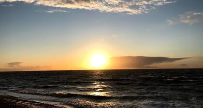 Sea-side holiday home with balcony views to the sea