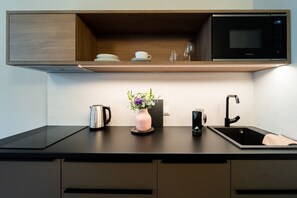 Apartment | Private kitchen | Fridge, microwave, stovetop, dishwasher