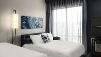 Ropa de cama de alta calidad, colchones con pillow-top y escritorio