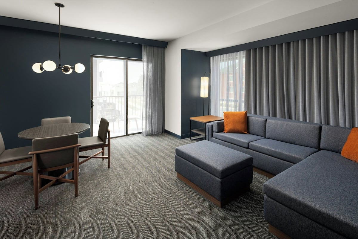 Suite, 1 Bedroom (Windows on 2 Sides) | Living room | 55-inch LCD TV with satellite channels