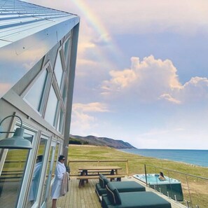 Terrace/patio - Mystical Beachfront Chalet , Hot tub , Sauna and Heated Container Pool (Cape Breton)