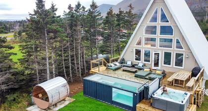 Mystical Beachfront Chalet , Hot tub , Sauna and Heated Container Pool.