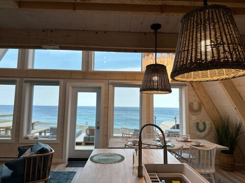 Mystical Beachfront Chalet , Hot tub , Sauna and Heated Container Pool