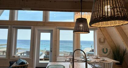 Mystical Beachfront Chalet , Hot tub , Sauna and Heated Container Pool