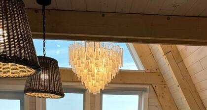 Mystical Beachfront Chalet , Hot tub , Sauna and Heated Container Pool