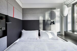 Ropa de cama de alta calidad y camas con pillow-top 