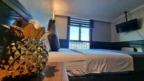 Habitación Royal | Cortinas blackout, tabla de planchar con plancha y wifi gratis 