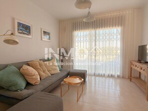 TV - Flat with terrace in Miami Platja (Mont-Roig del Camp)