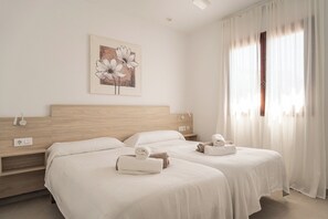 3 habitaciones, tabla de planchar con plancha y wifi gratis 