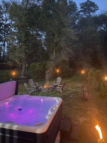 Minutes to the Beach with a hot tub and decks for relaxing.