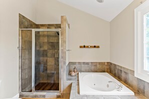 Jetted tub, hair dryer, towels, soap