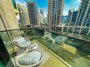 Deluxe Apartment | Balcony - HiGuests - Act Tower 1 (Dubai)