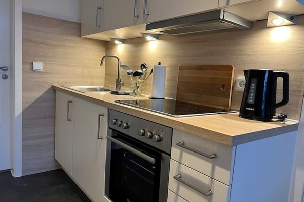 Geladeira, cooktop, lava-louças, cafeteira/chaleira