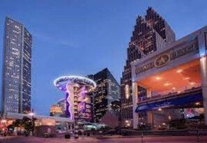 Experience the vibrant city atmosphere with its iconic landmarks and modern skyscrapers.