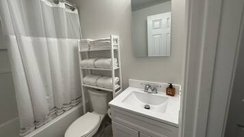 Hair dryer, towels, soap, shampoo