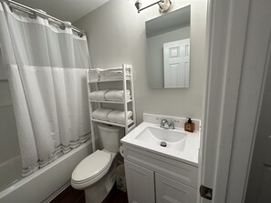 Hair dryer, towels, soap, shampoo - This two-bedroom cottage features one queen bed, two twin beds, and a sofa bed. (Nantucket)