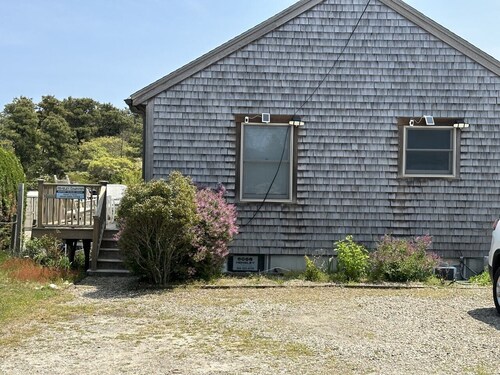 This two-bedroom cottage features one queen bed, two twin beds, and a sofa bed.