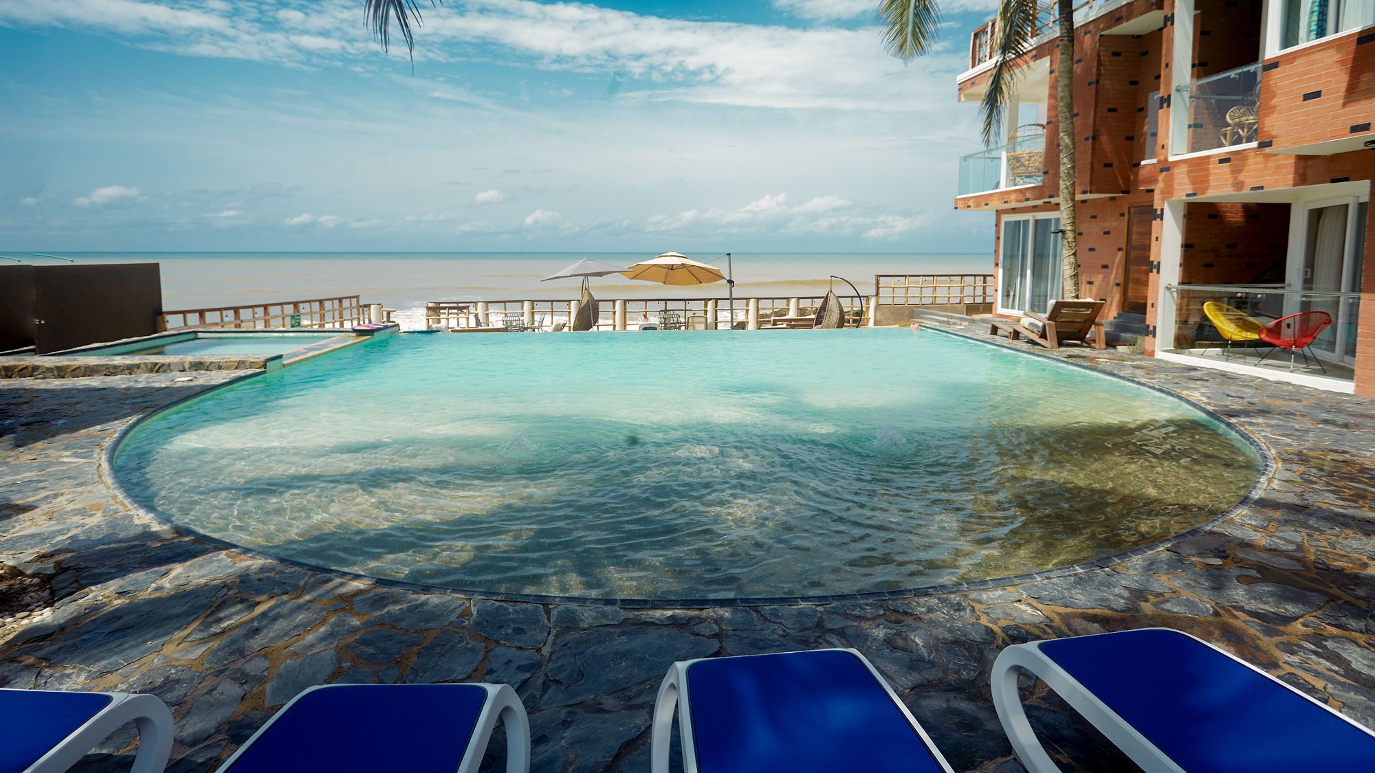 Outdoor pool, open 7:00 AM to 9:00 PM, pool umbrellas