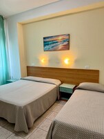 Family Triple Room, Mobility Accessible | Free WiFi, bed sheets