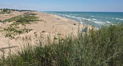 Newly built 4-bedroom cottage w/ WiFi & AC next to dunes, Lake Michigan & beach