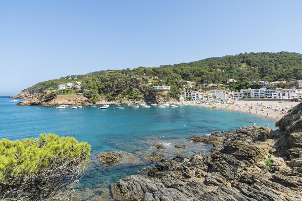 Enjoy breathtaking views of the sea and surrounding landscape from this coastal retreat.