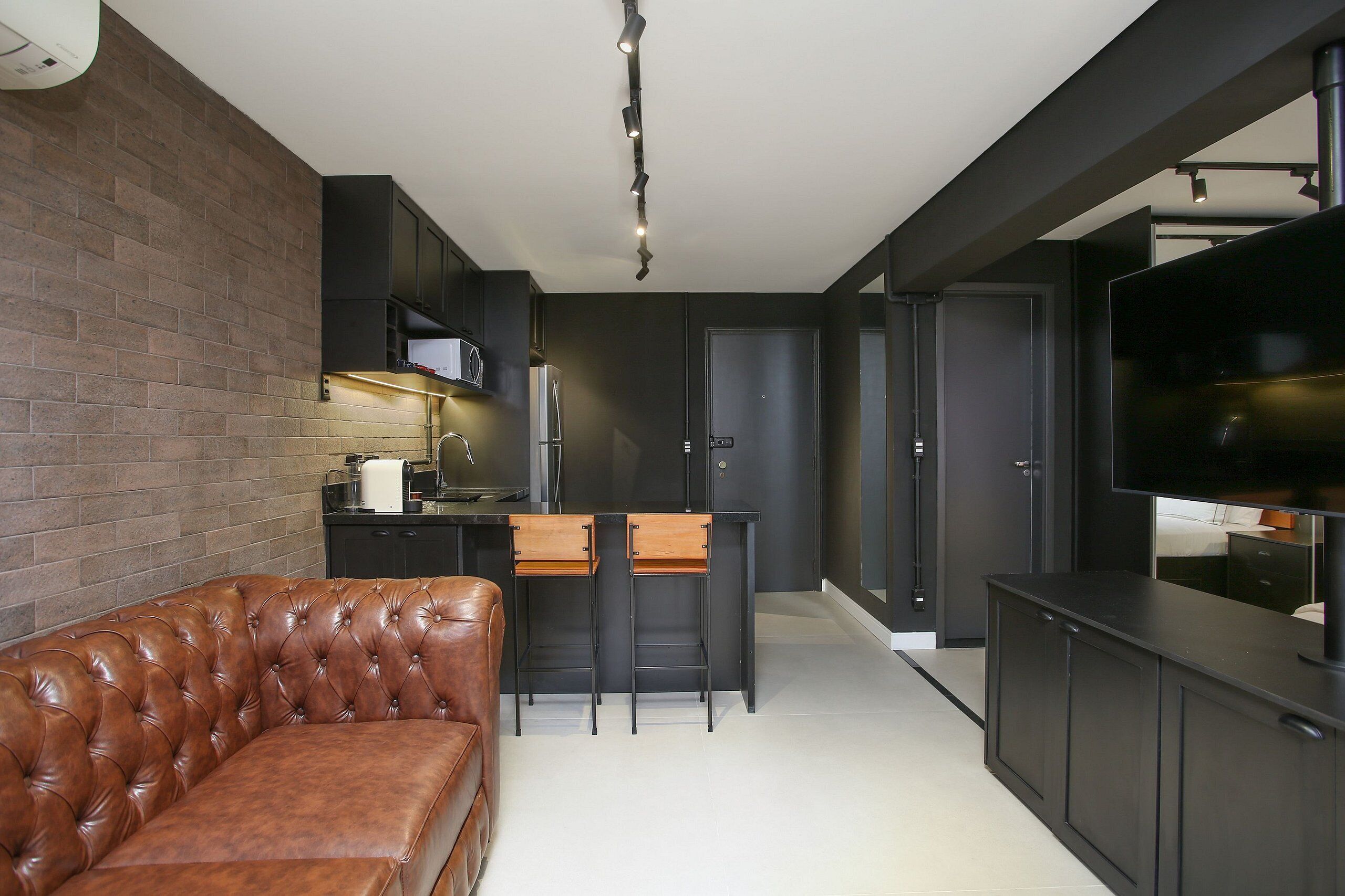 Monolocale Design | Area soggiorno | Smart TV 40 pollici con canali satellitari, TV