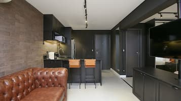 Monolocale Design | Area soggiorno | Smart TV 40 pollici con canali satellitari, TV