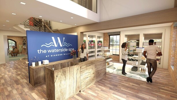 Ein Empfangsbereich mit einem blauen Schild, auf dem 'The Waterside Spa at Diamond Mills' steht.