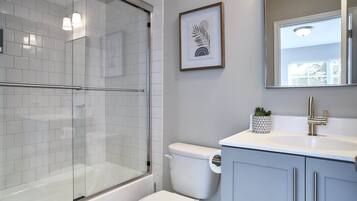 Hair dryer, towels, soap, shampoo