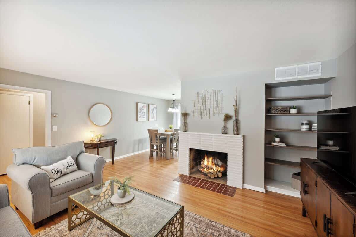 TV, fireplace, books, offices