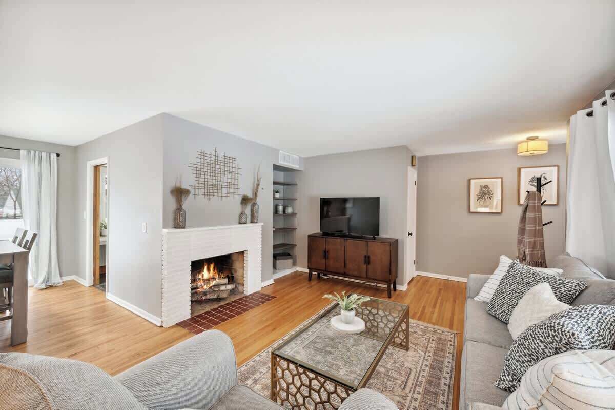 TV, fireplace, books, offices