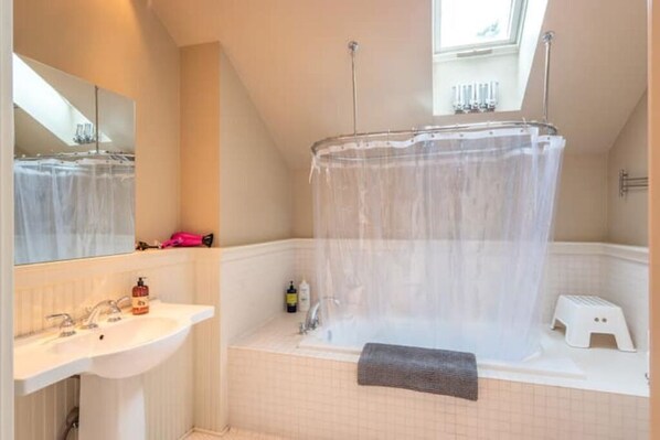 Hair dryer, towels, soap, shampoo