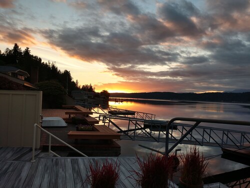 Quaint beachfront home with bulkhead and swim float.