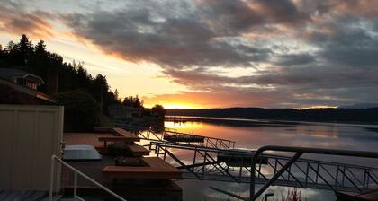 Quaint beachfront home with bulkhead and swim float.
