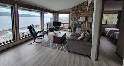 Quaint beachfront home with bulkhead and swim float.