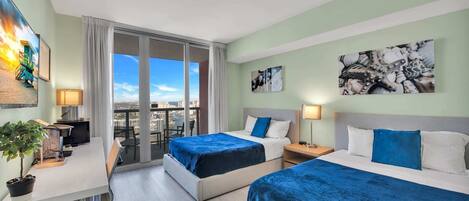 1 bedroom, desk, iron/ironing board, travel crib