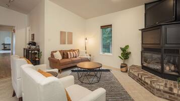 Smart TV, fireplace, DVD player, books