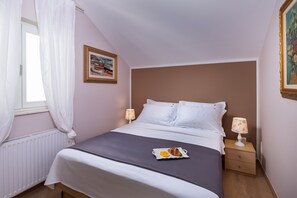 2 chambres, fer et planche à repasser, Wi-Fi, draps fournis