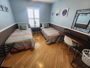 4 bedrooms, desk, iron/ironing board, travel cot