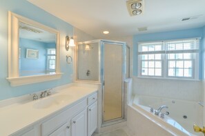 Shower, jetted tub, hair dryer, soap